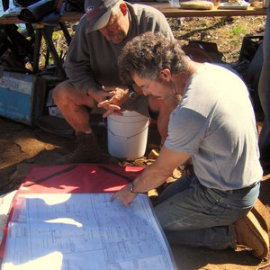 Mike Hayworth looking over blueprints
